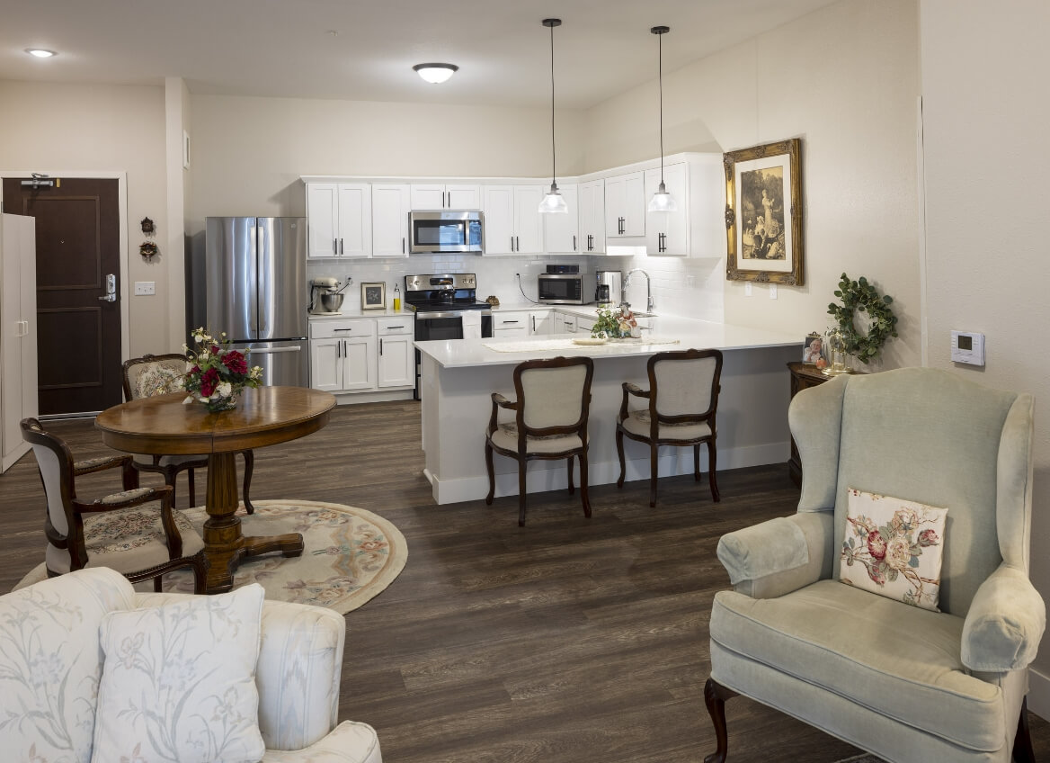 Full kitchen with seating and living area