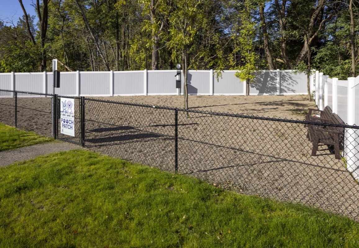 Fenced-in dog park area labeled “Pooch Patch”