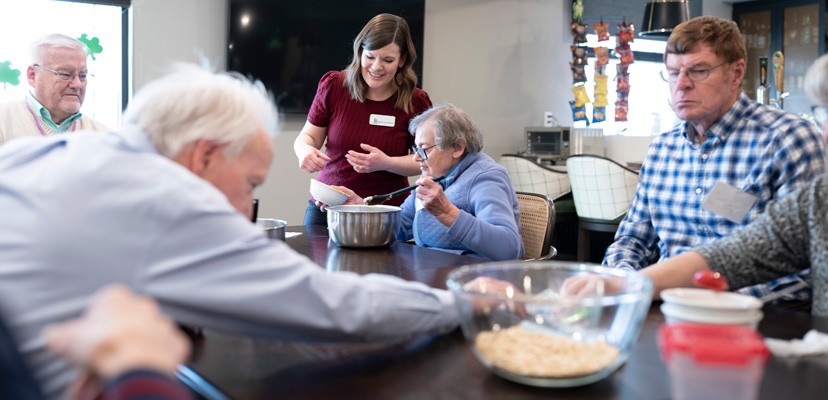 Participants of The Gathering at Lino Lakes spend some time baking a healthy and non-healthy version of a sweet treat to see what they prefer.