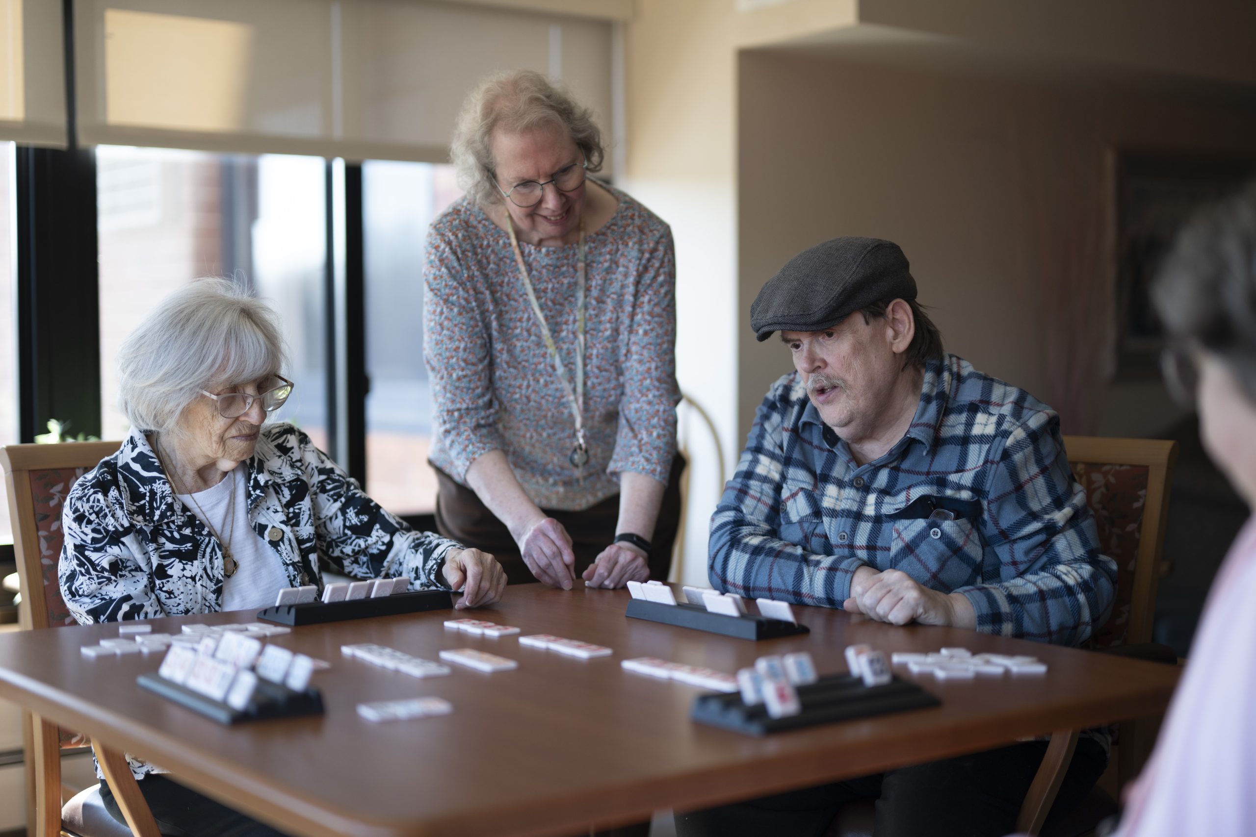 Residents at the Lyngblomsten Apartments playing a game