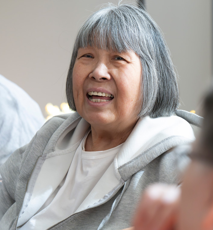 Lyngblomsten Apartments Resident smiling into the camera