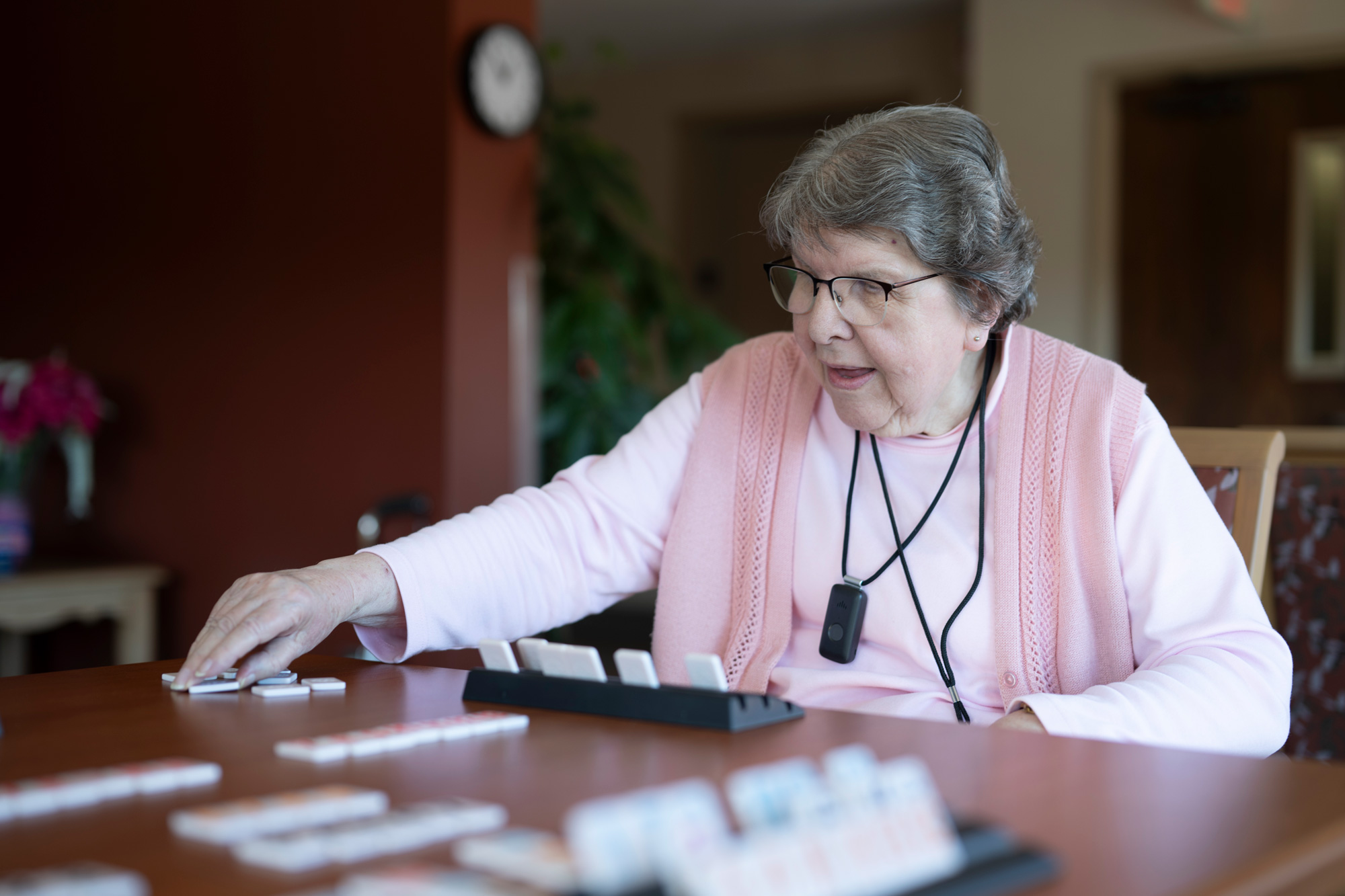Resident of the Lyngblomsten Apartments Plays Game in the Lounge
