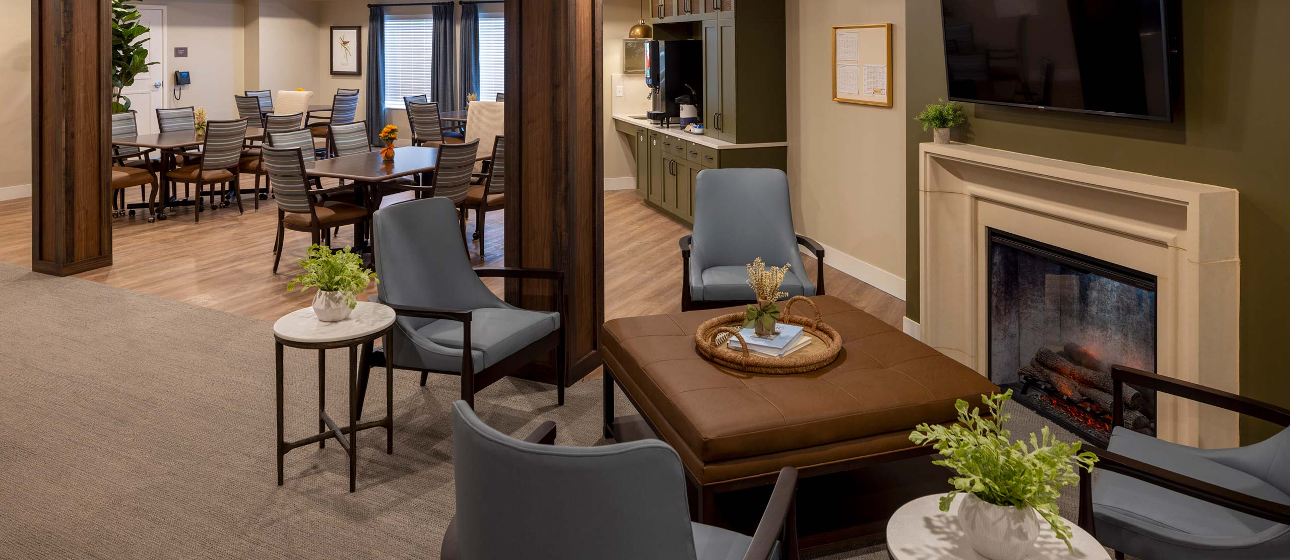 Assisted Living Common Areas -- Dining Room and Sitting Area Near a Fireplace